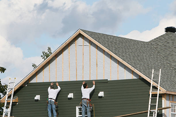 Professional Emergency Siding Repair technician working in Irwin, OH
